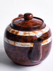 A good colour-way 4 cup original Brown Betty teapot with marbled banding and splatter glaze.