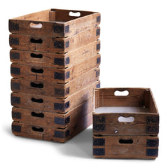 We have just ten of these wonderful vintage potter's crates. Once used in the Staffordshire potteries for transportation of greenware (unfired ceramics) to the kiln, each pine potter's tray has time-worn slot handles, metal corner braces, and a plywood base. They are great for home storage, as they can be stacked one on top of the other, and would work well in the kitchen, office or shed as sliding drawers under a table or other work surface. 