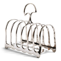 An Edwardian silver plated hooped toast rack with top carrying handle and scalloped sides, designed to take 6 slices of toast.  It has good weight and a succession of silver marks on its underside.