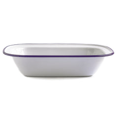 A white enamel pie dish with blue rim