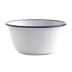 A white enamel prep bowl or pudding bowl with a blue rim