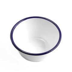 A white enamel prep bowl or pudding bowl with a blue rim