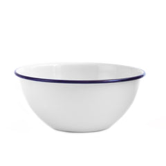 A white enamel salad bowl with a blue rim
