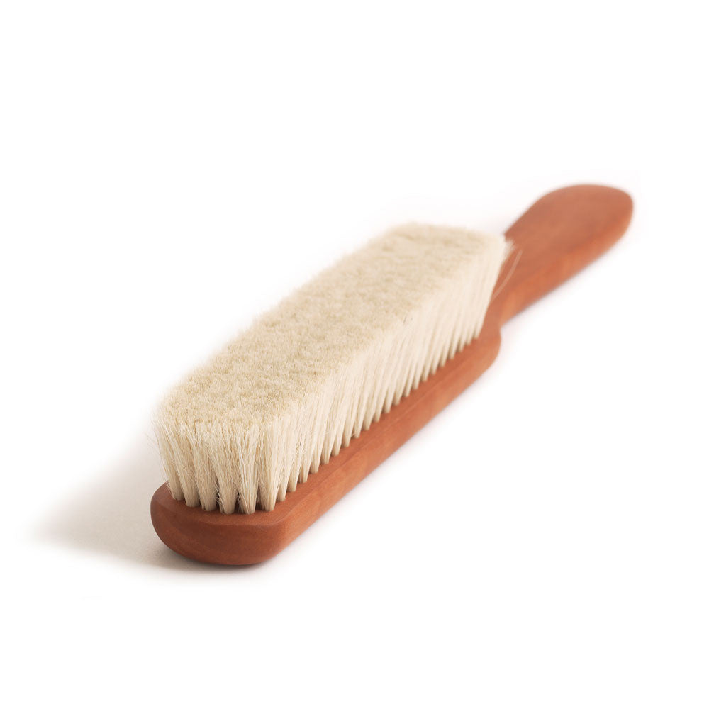 This elegant brush of soft goat’s hair and polished pear wood is perfect for dusting off the tops of your shelved books. Yet it is as equally at home at your table or desk, for it makes an excellent crumb brush or laptop and keyboard dusting brush. It's the perfect present for your bookish friends and for those fastidious with tablecloth or computer screen management.