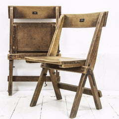 Very good-looking cricket pavilion chairs, each with a small enamel number affixed to its back (numbers 18 and 20). Each is beautifully constructed of solid beech and designed to fold flat when not in use, and so can easily be stored.