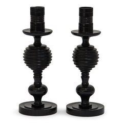 A striking pair of 1930s ebony candlesticks, each with turned concave fluting. Most likely made in Africa for the European market. 
