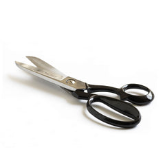 Our large cropped shear is particularly suited to those who handle the cutting of materials day-in day-out. The semi-rounded points of its blade ends avoid the snagging of fabrics as you work, and the micro-serrated blades cut crisply and effortlessly. The offset shanks (the arms holding the handles) allow you to cut while the material remains flat to the work surface it is resting upon. The under bow (handle) is large, its upper inner-side curved, making it very comfortable to hold during constant use.