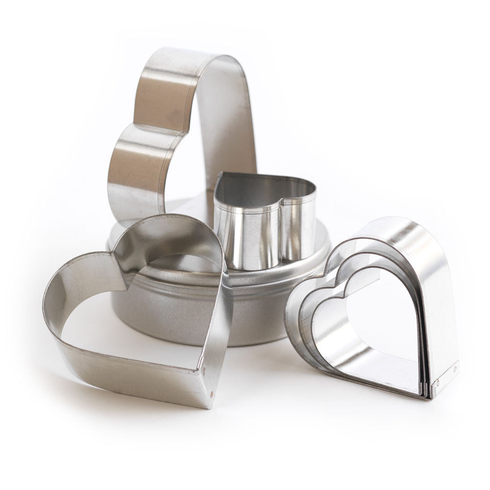 A set of six graduated heart-shaped biscuit cutters with storage tin. Ideal for the making of gingerbread hearts to hang on the Christmas tree or heart-shaped toasts for your loved-one's Valentine's Day breakfast.