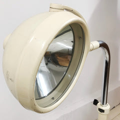 A striking 1950s adjustable dental lamp by Carl Zeiss Jena showing swivel mounting