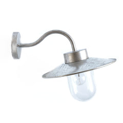 Our classic outdoor swan-necked light is hot-dipped galvanised: submerged in molten zinc, to make it truly weatherproof.  A finish generally used in heavy industry, such as on pylons. It is not susceptible to rust, and so will last many years.