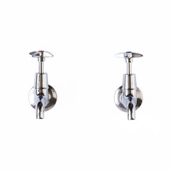 A handsome pair of wall-mounted chrome plated bib taps, each marked with a red and blue dot to denote the hot and the cold. 